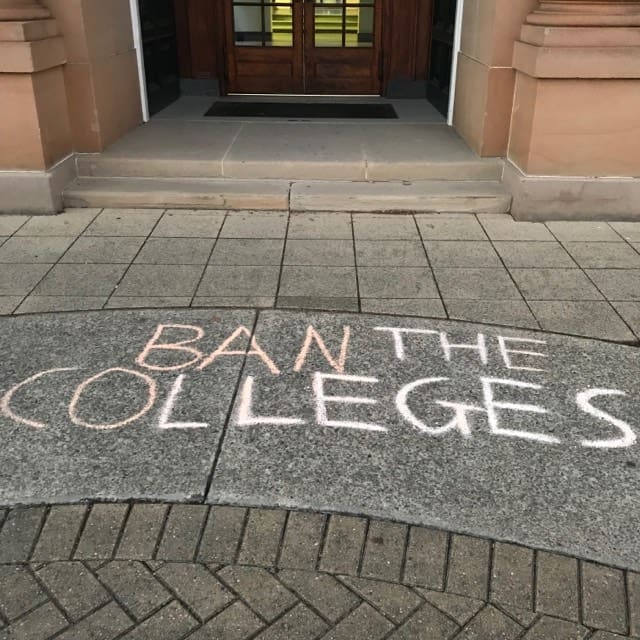 Ban the Colleges - Chalk Graffiti