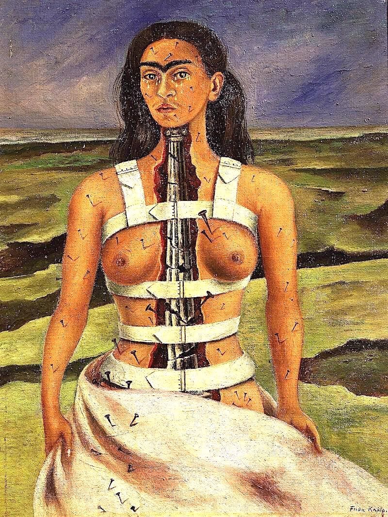 Image Description: A painting of Frida Kahlo standing in front of an arid landscape. Her lower body is wrapped in a white sheet. Her upper body is naked except for the white strips of a medical corset and is split down the middle, revealing an Ionian column. Nails pierce her flesh and continue down the sheet on her right side. 